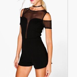 NTW black romper with mesh details​​​